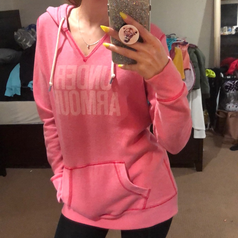 Pink Under Armor hoodie.